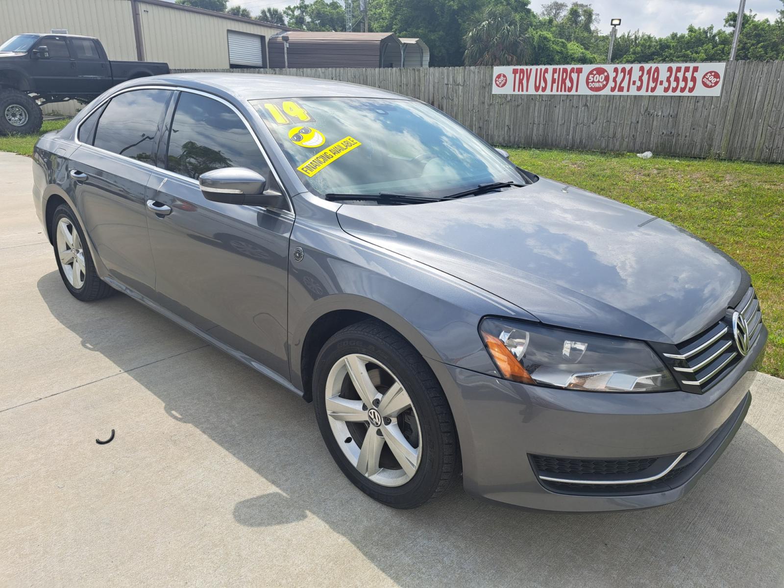 2014 Black Volkswagen Passat 1.8T S AT (1VWAS7A31EC) with an 1.8L L4 TURBO DIESEL engine, 6-Speed Automatic transmission, located at 1181 Aurora Rd, Melbourne, FL, 32935, (321) 241-1100, 28.132914, -80.639175 - Photo #1